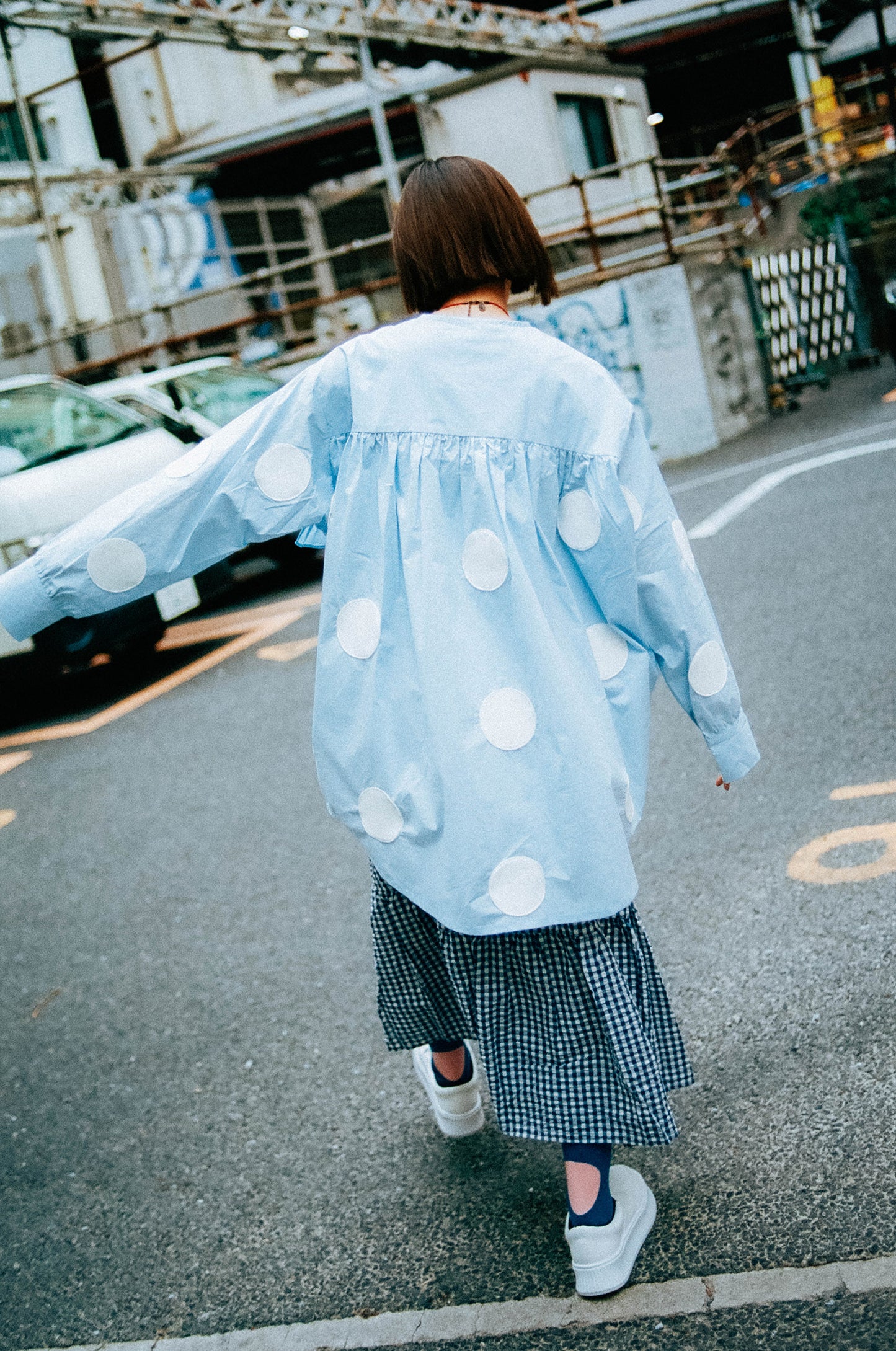 Polka dots on sleeve blouse with ruffles