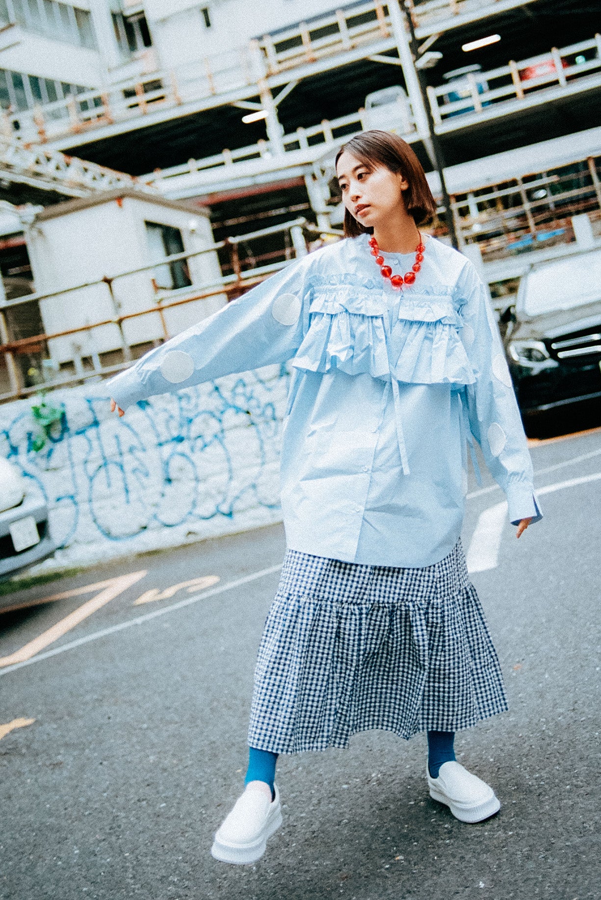 Polka dots on sleeve blouse with ruffles