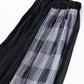 Asymmetrical skirt with different materials