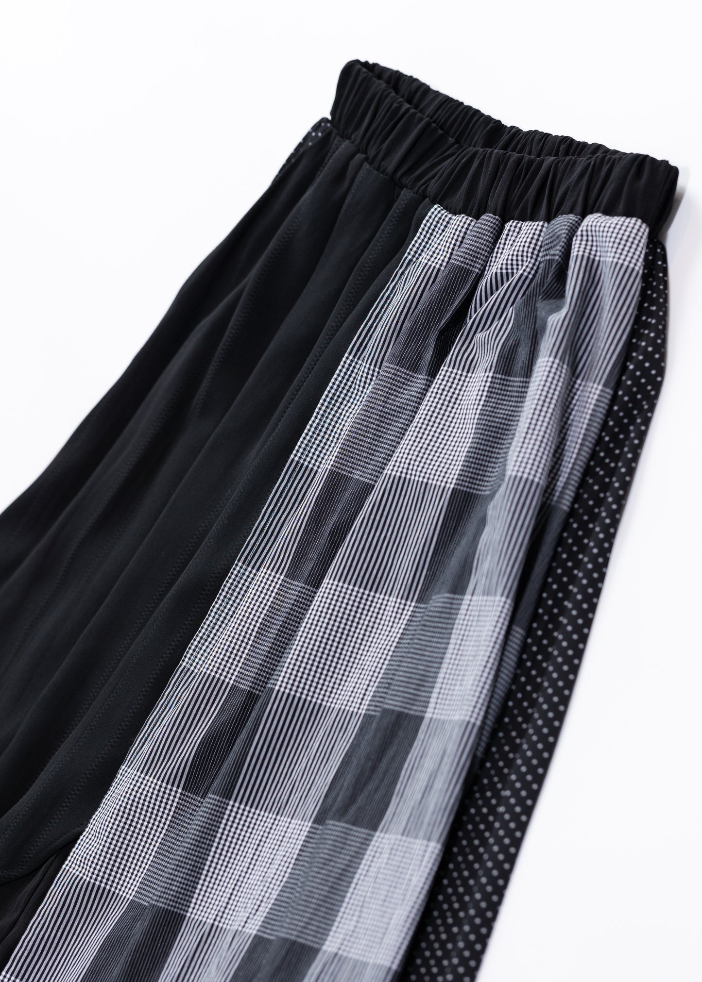 Asymmetrical skirt with different materials